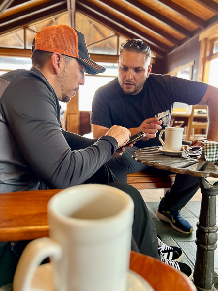 Fly anglers relaxing at the lodge after a day fishing Patagonian rivers